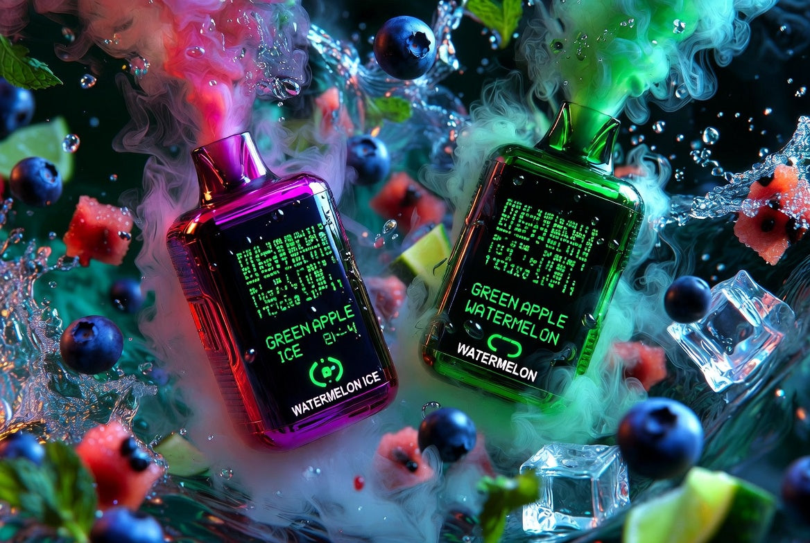 Two sleek vape devices with digital screens emit colorful vapor—one glowing pink and purple, the other green. They float among splashing water, ice cubes, blueberries, mint leaves, and watermelon pieces, creating a vibrant, dynamic scene. The screens display flavors like “Green Apple Ice” and “Watermelon,” emphasizing freshness and fruit intensity. The composition combines futuristic design with energetic tropical imagery for a bold, high-impact visual.